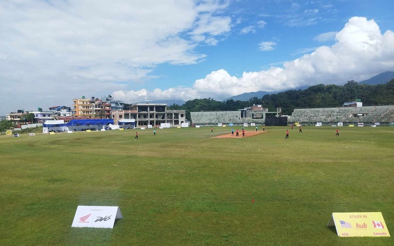 Mulpani Cricket Stadium in Nepal, with a match in progress on the outfield. Photo: Mr.Sedhain / Wikimedia Commons (CC BY-SA 4.0)