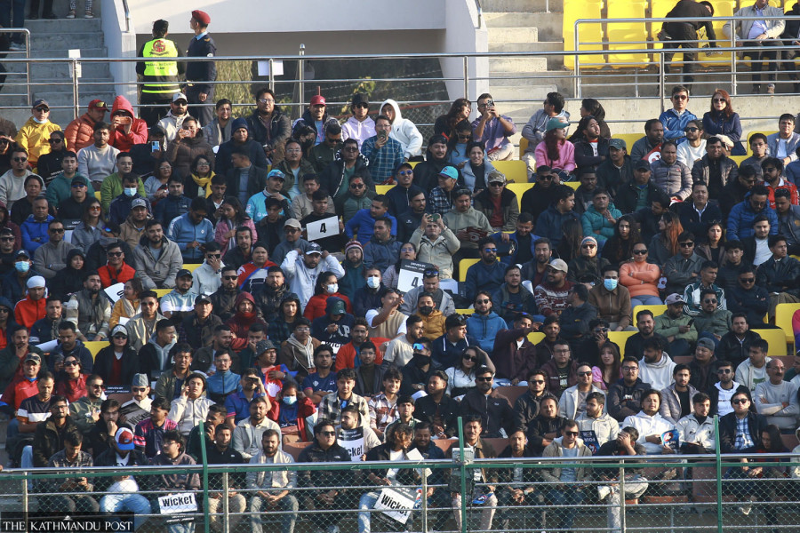 Cricket fans in the stands at the Tribhuvan University International Cricket Ground in Kirtipur during a Nepal Premier League match. Photo: The Kathmandu Post