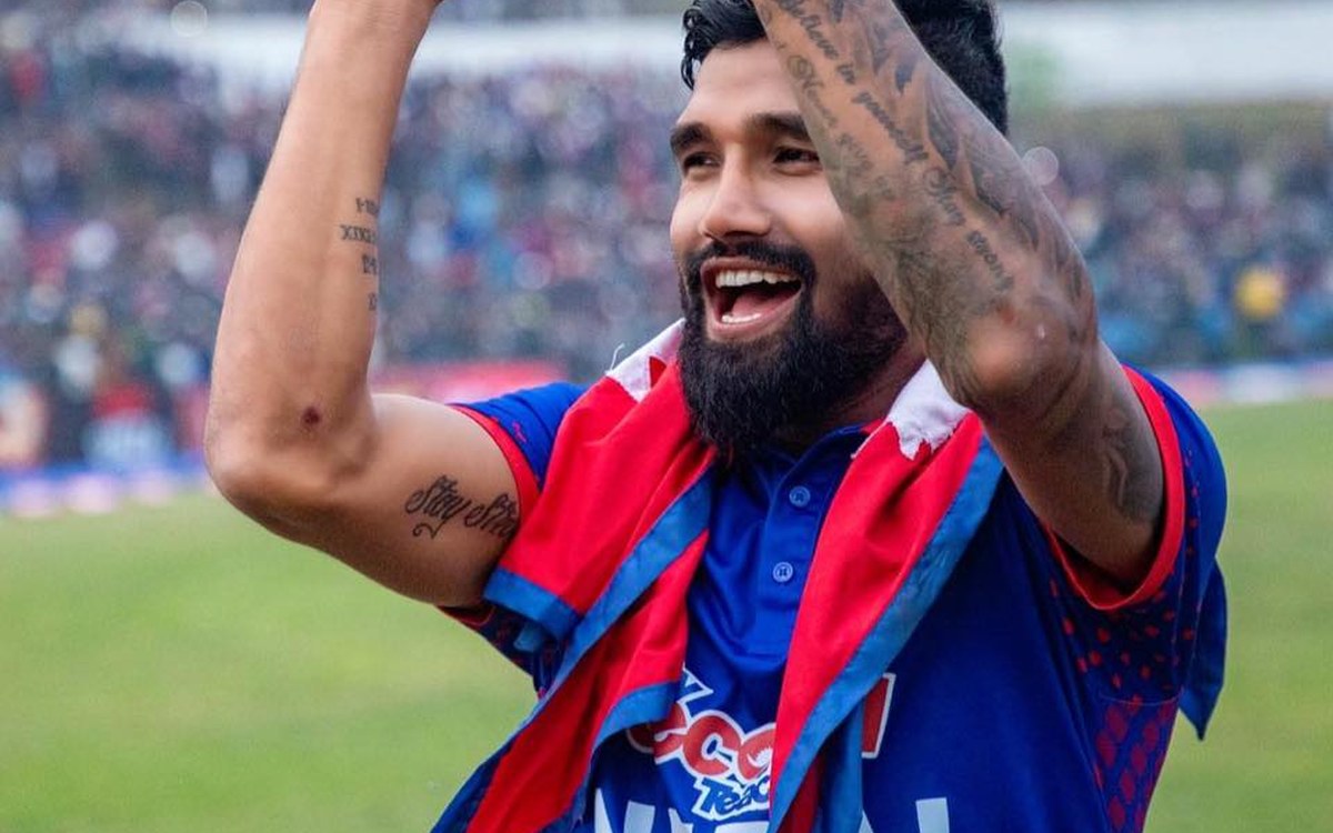 Sudurpaschim Royals captain Dipendra Singh Airee celebrating in Nepal's blue jersey at a cricket ground